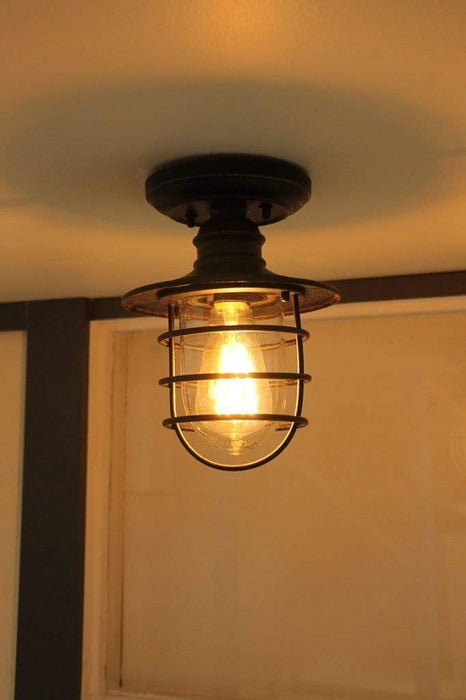 Nautical style ceiling light. flush mount outdoor fitting. cage light for outdoors