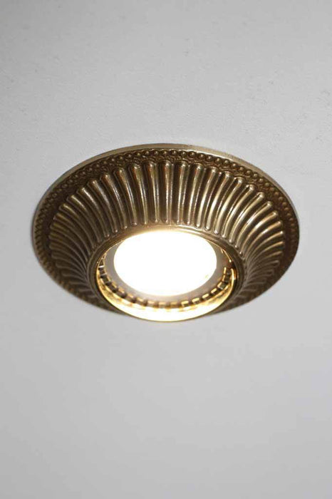 Old brass period style lighting accessory. recessed downlight cover.  