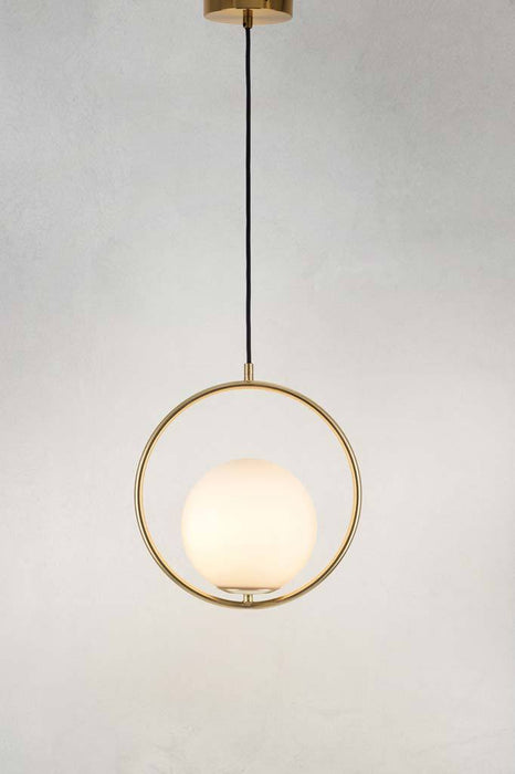 Opal glass pendant light with brushed brass finish