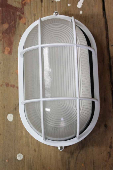 Oval cagaed bunker light in white