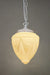 glass pendant light with white chain cord. 