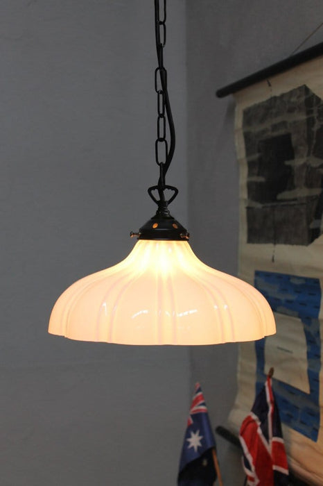 Mayflower glass pendant light with black chain cord and opal glass shade