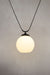 Medium round open bottom opal glass shade with trapeze pendant cord