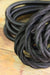 Close-up of black twisted cord. 