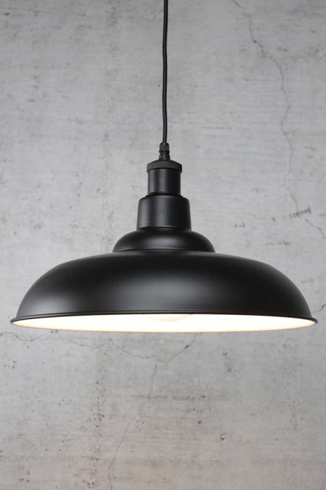 Pendant light with black steel shade