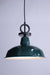 Pendant light with small green shade and black cord with disc