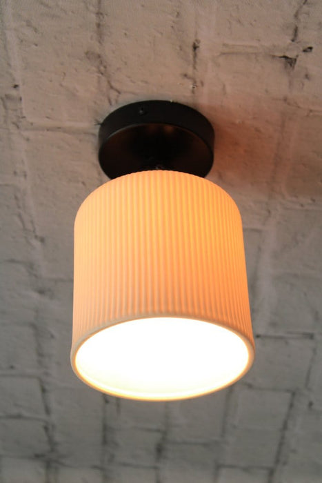 Ceramic flush mount light close up