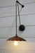 Pulley wall light with small rust shade