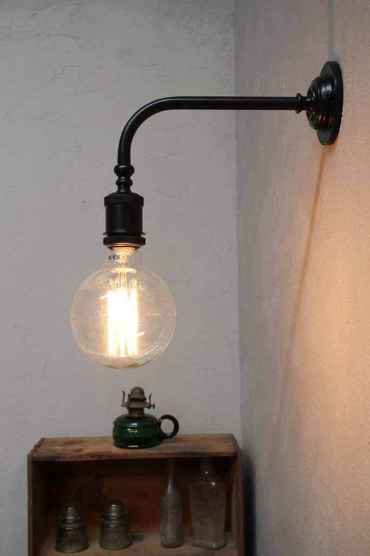 Quality brass lighting accessory. matt black wall sconce. 90 degree wall sconce.