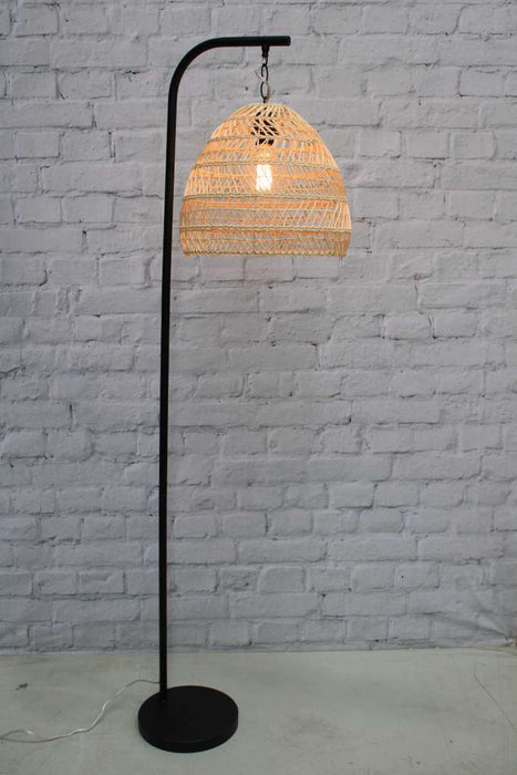 Black floor lamp with suspended rattan shade