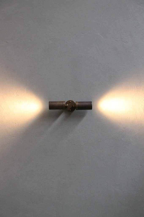 Raw copper LED spotlights. Will develop a natural patina over time. Flush mount lighting or wall mounted. Perfect for coastal homes or seaside living. Two beams of adjustable light