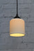 Ribbed ceramic pendant light with black gallery