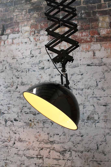 Robust sturdy and large this industrial scissor light has the wow factor that will instantly transform a space with some good old industrial flair. Tilting shade.