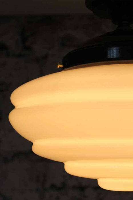 Rockabilly glass flush mount light has soft curves and rounded line for retro style