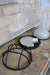 Round caged bunker lights for the outdoors with ceramic lampholder and black or white cage finish