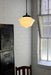 Round black cord pendant light with small shade