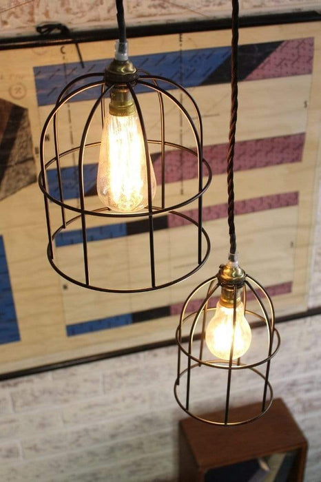 Round cage lights in black paired