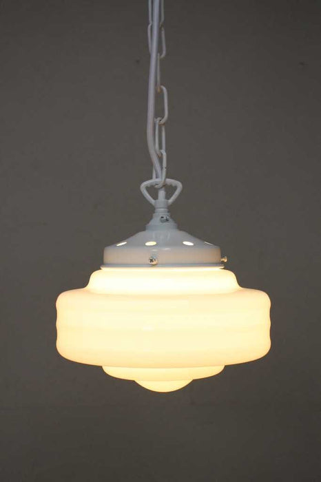 schoolhouse glass shade on a white chain pendant