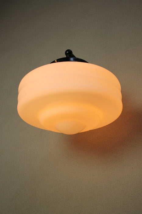Schoolhouse wall light from below with large shade