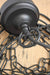 Sleek black metalware bolthead on top of the chain and cord pendant cord lighting accessory