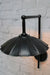 black wall light with large umbrella shade