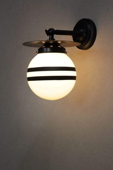 Small black adjustable steel wall light with opal two stripe shade