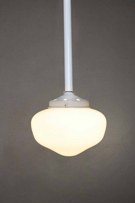 Small opal shade with white suspension pole