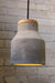 Small concrete timber pendant with concealed bulb
