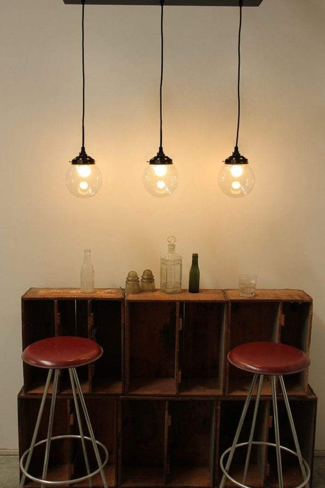 Small clear 3 light pendant with black cords