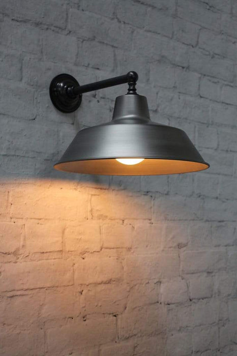 Steel wall lamp with quality brass sconce arm