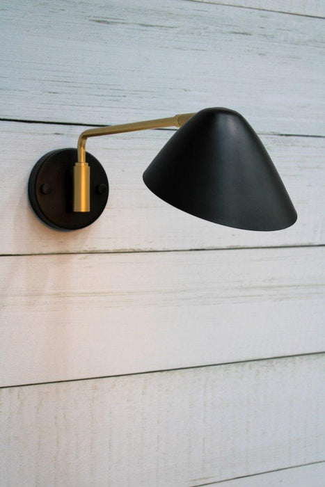 Steel wall light with tiltable shade
