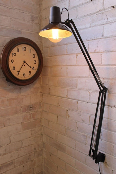 Superlux wall lamp has a long reach ideal for reading or task lighting
