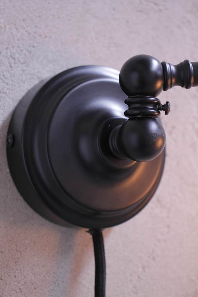 Swivel wall sconce with rotary joint