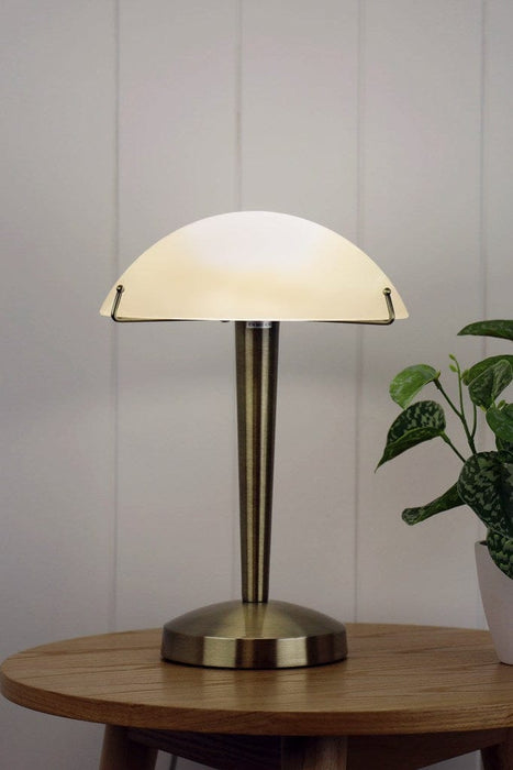 Deco Touch Base Lamp in the antique brass finish