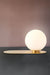 Gold/brass table lamp with opal glass shade