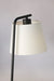 White fabric shade of table lamp
