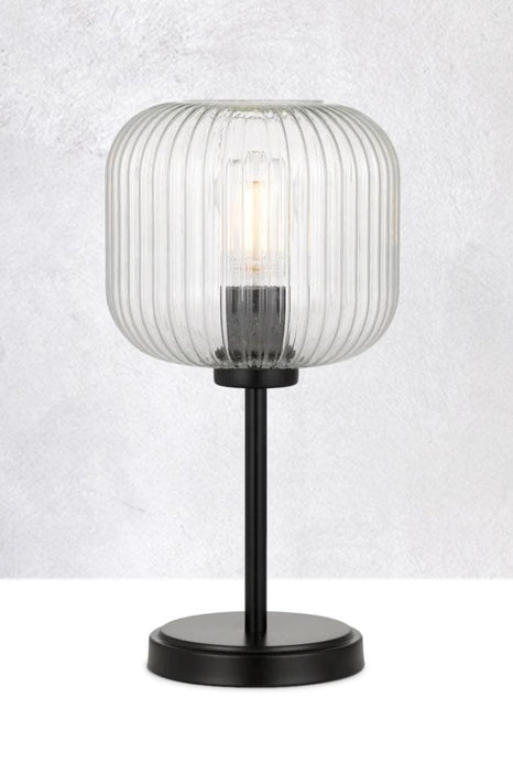 Clear glass table lamp with black base