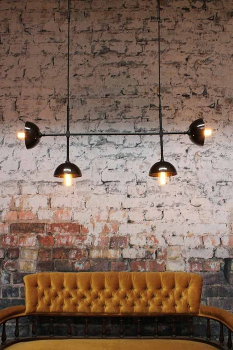 The bakelite bowl junction light is a 4 pendant chandelier with vintage bakelite shades on a quality brass frame