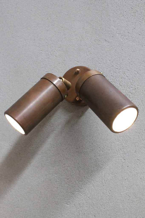 The copper outdoor double spotlight is a wall mountable so you can point individual beams at ornaments or highlights