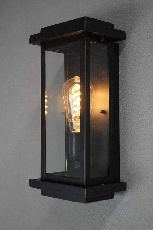 The sturbridge exterior wall light takes cues from 19th century street lighting aesthetics.