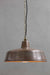 The outdoor copper pendant light has brass chain and black pvc cord
