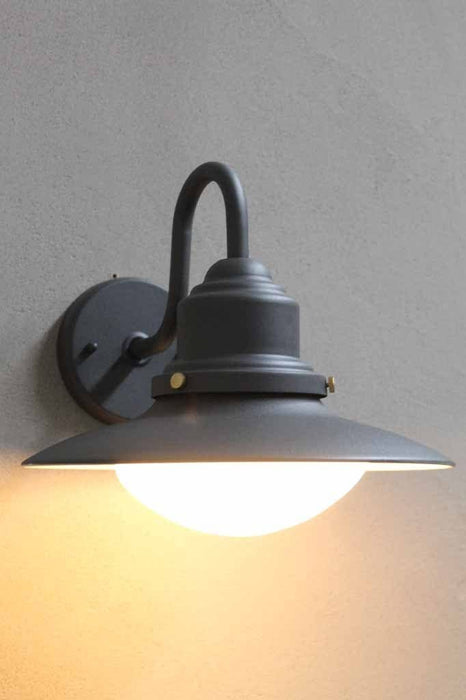 This outdoor wall light is available in two finishes to suit a range of exterior styles with ease. Graphite and white. Exterior wall lights online Melbounre
