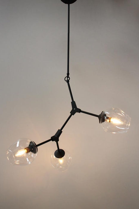 Three light chandelier spatial arrangement 