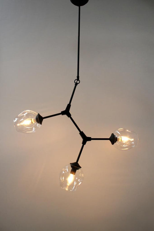 Three light chandelier spatial arrangement
