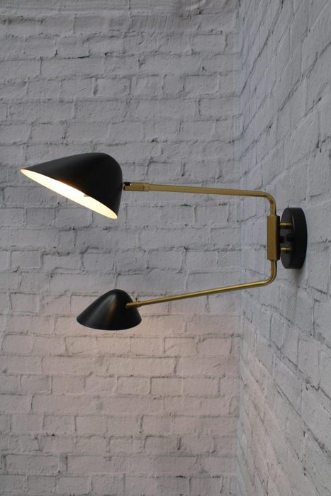 Wall light with swivel arms