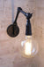 Two arm swing wall lamp with x large edison bulb