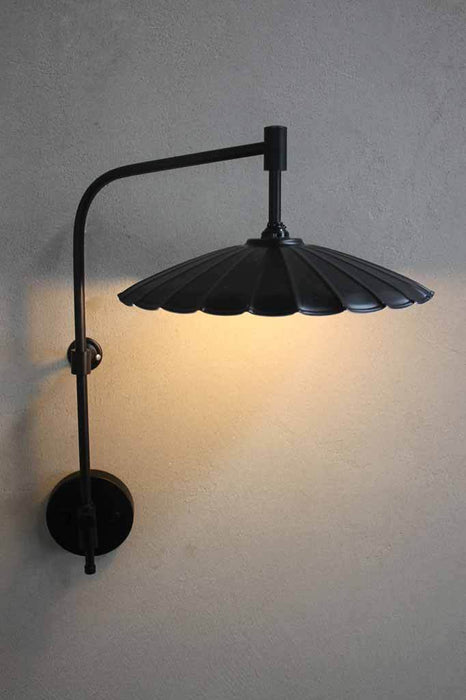 Umbrella wing arm wall lamp. rustic charm with industrial