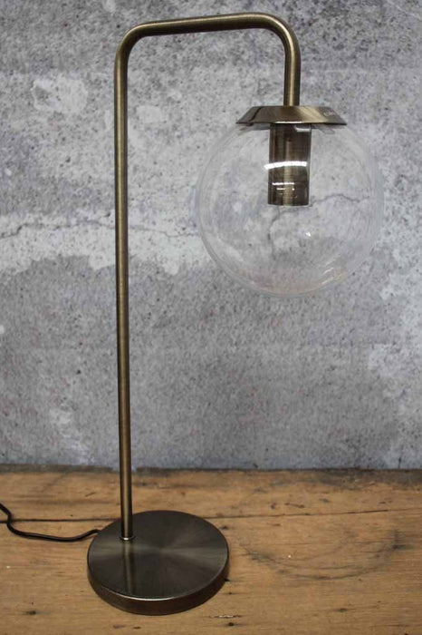 Unlit view of angular contemporary minimalist vintage lighting with brass finish and glass sphere cone