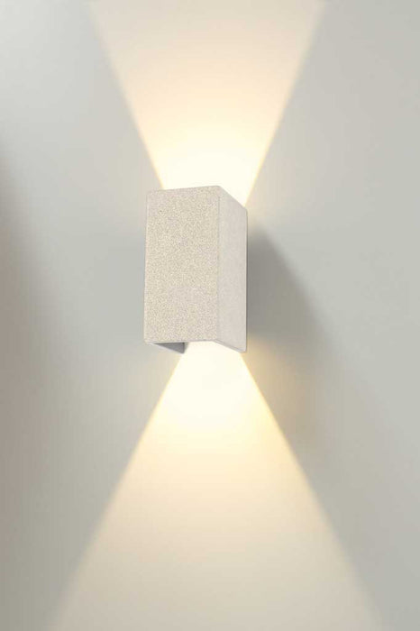 Up down LED wall light in white sandstone