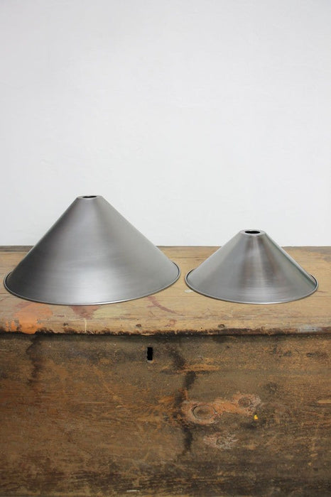 Large and small vintage steel shades